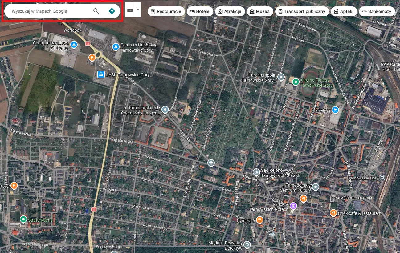 Wybranie adresu do zgłoszenia zamazania budynku w Google Maps Street View.